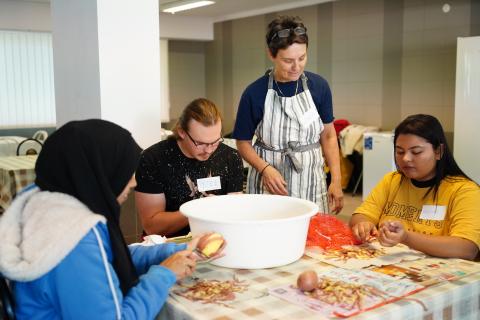 making potato pancakes with international and Hungarian students